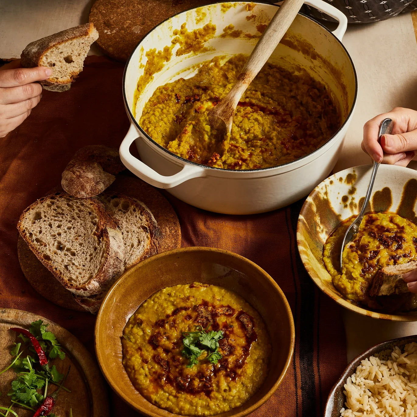 Image of dahl being served at a table